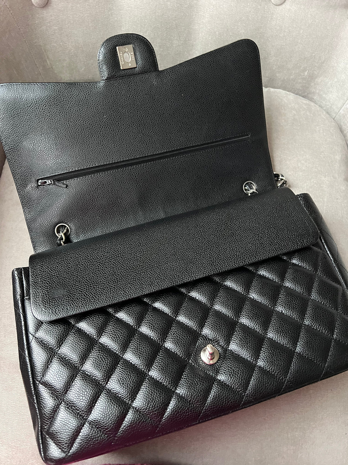 Chanel Maxi Double Flap in Black Caviar