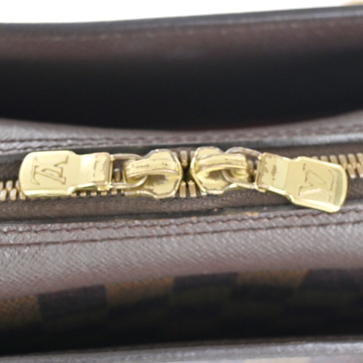 LOUIS VUITTON Triana Handbag