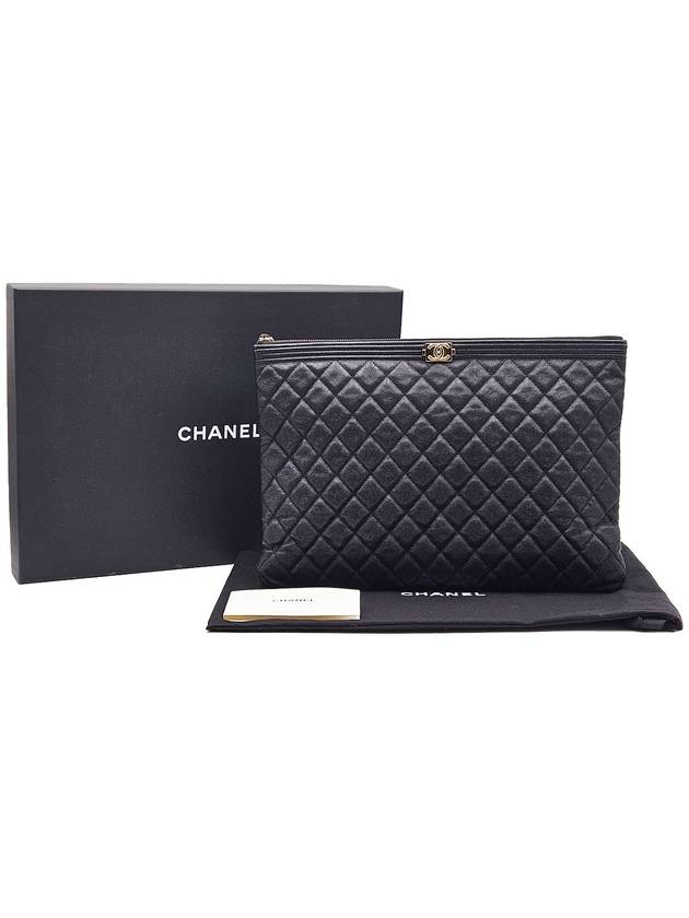 Chanel A84407 Black Caviar Champagne Gold Metal Boy Large Clutch Unit 29 Chanel