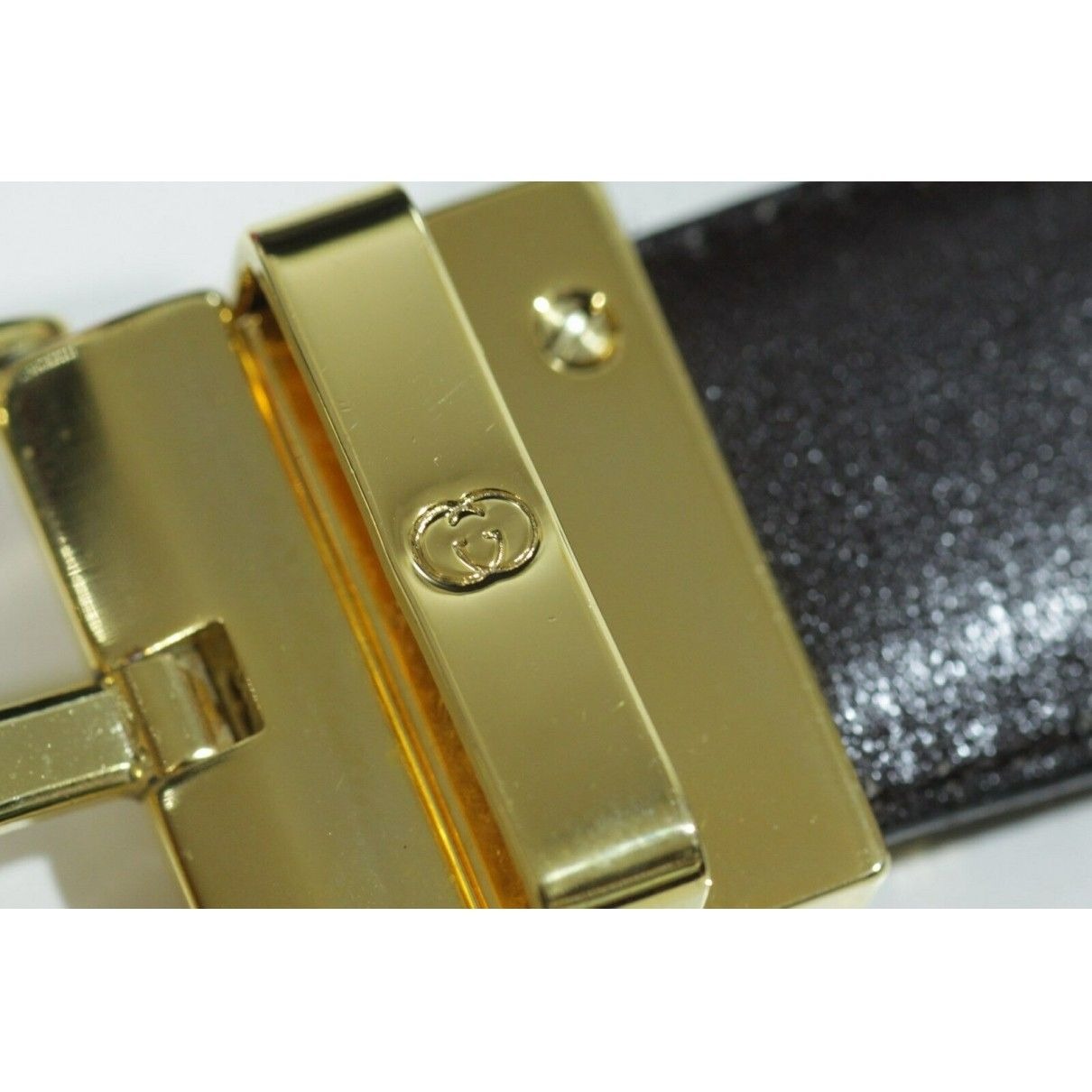 Vintage, NOS, Gucci, brown or black leather, reversible belt with a removable, rectsngular gold tone buckle with red and green enamel