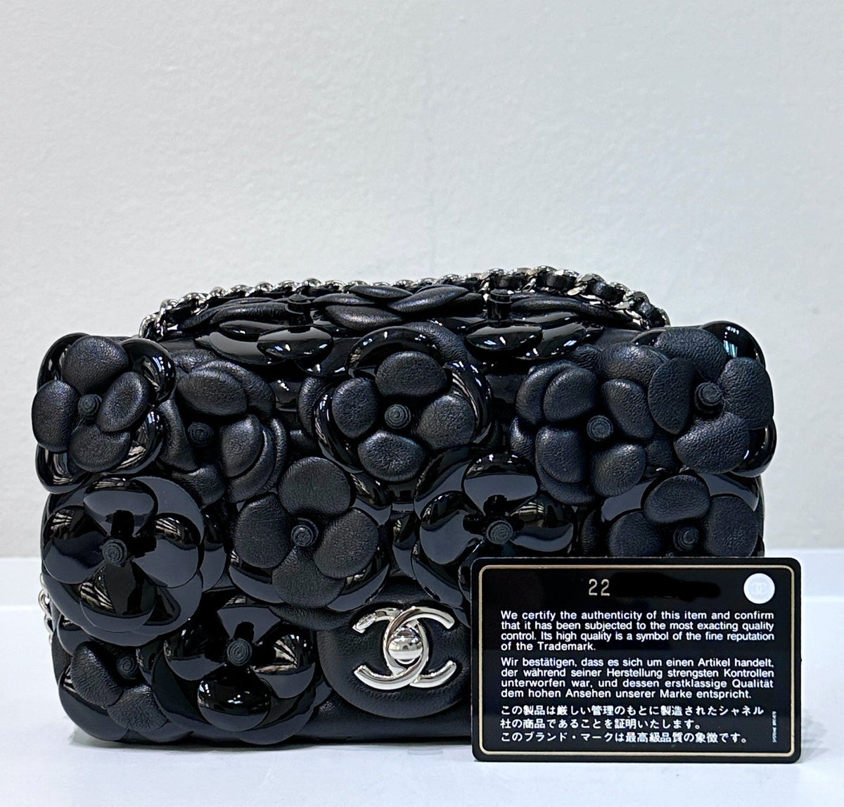 Chanel Limited Edition Black Camellia Mini Flap Bag.