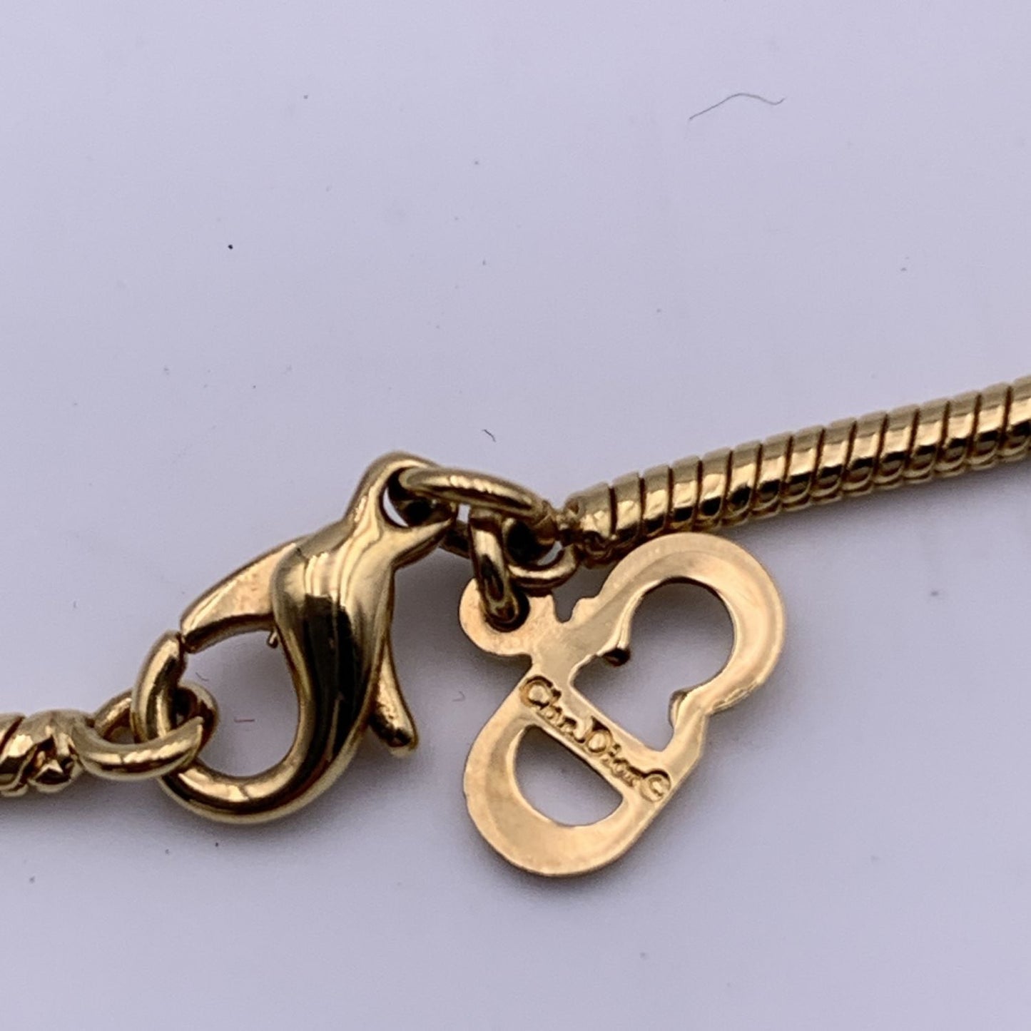 CHRISTIAN DIOR Gold Metal Dangling Charms Logo Necklace