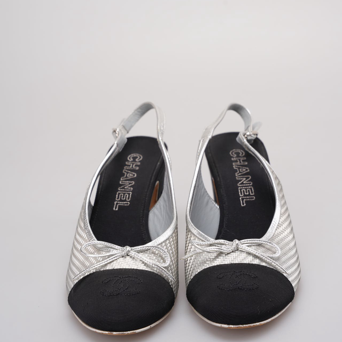 Chanel Woven Plastic Grosgrain Cap Toe CC Slingback Pumps in black and silver 39.5