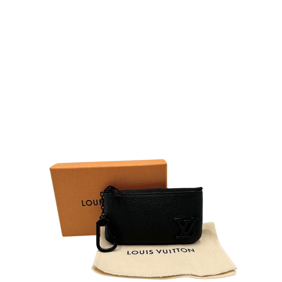 Pochette Clé Louis Vuitton in pelle nera aerogram. Accessori di lusso usati ed i