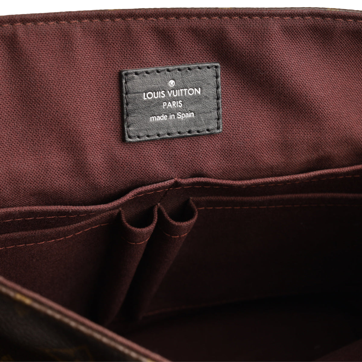 District MM - Monogram Canvas