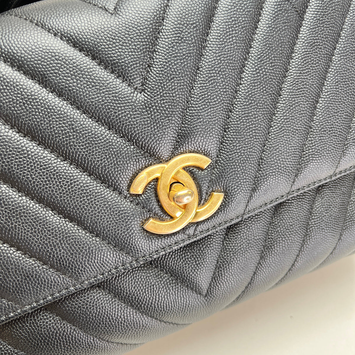 Coco Medium Black Top Handle Bag in Caviar Leather, Gold hardware
