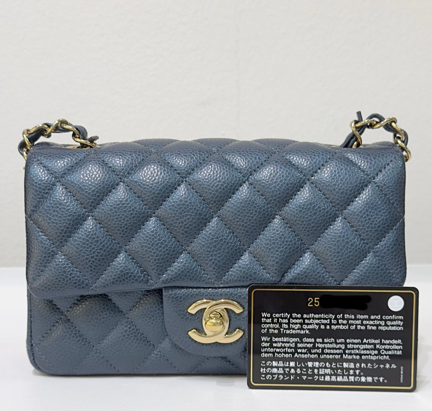 CHANEL Pearly Caviar Quilted Mini Rectangular Flap Navy Blue 18S