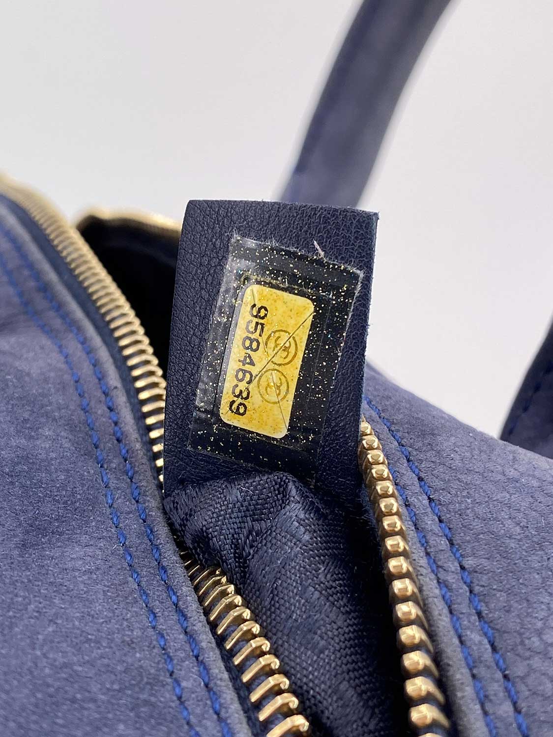 Chanel Quilted Soft Caviar Leather Mini Tassel Bowling Bag Blue