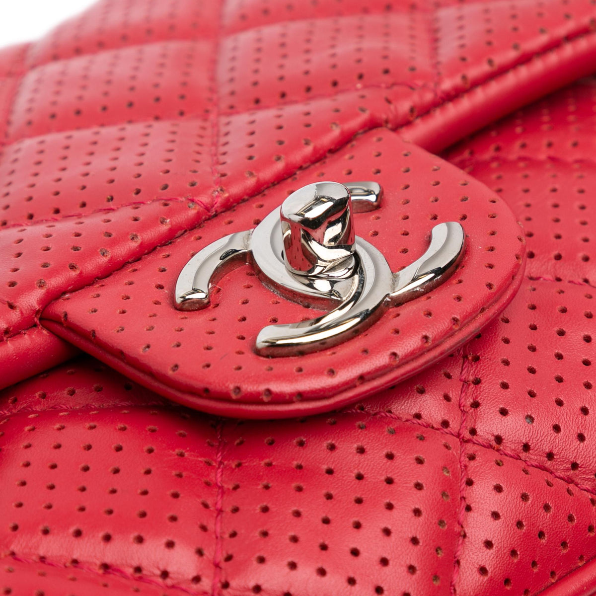 Chanel Medium Perforated Lambskin Punch Flap (SHG-PkZhhC)