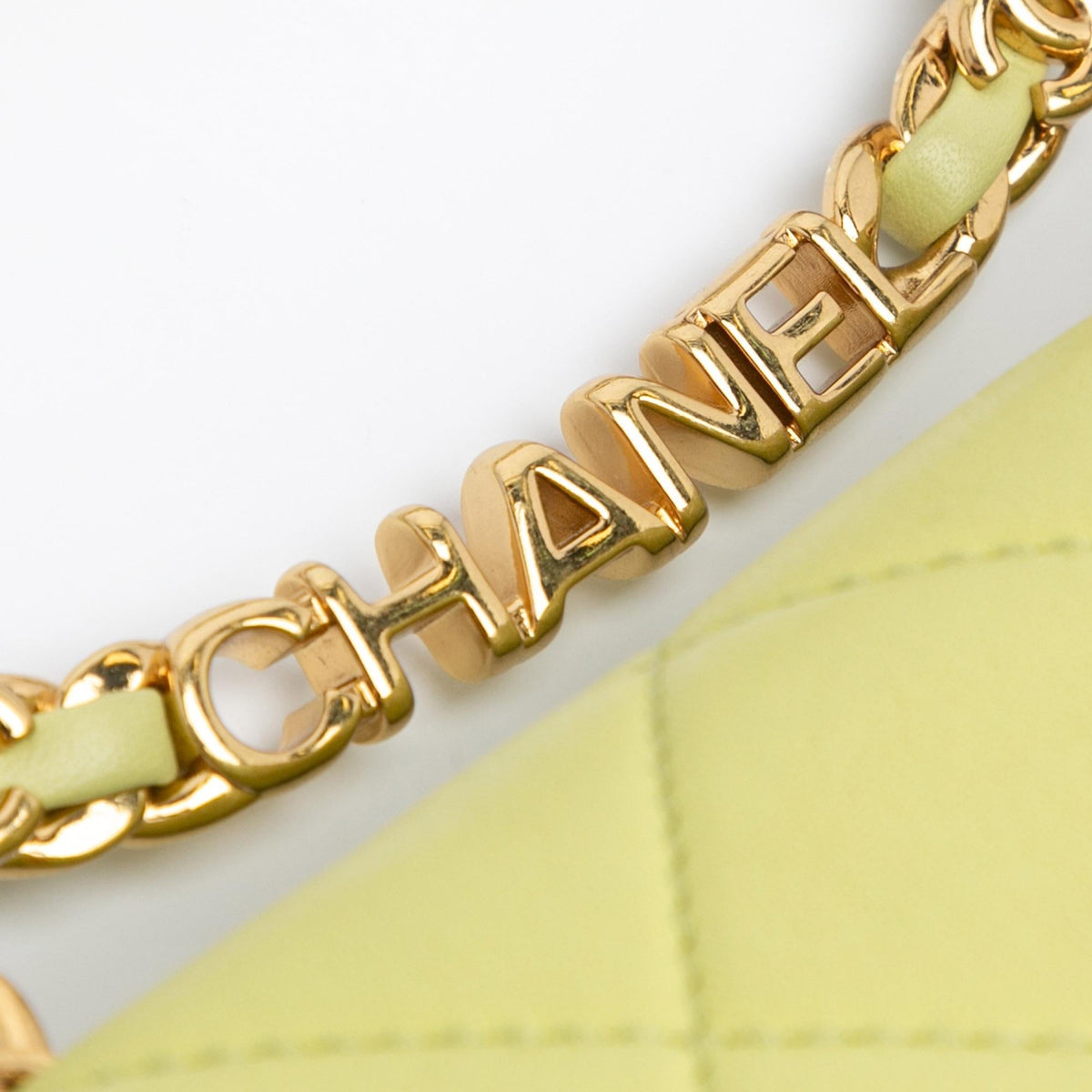 Chanel Mini Quilted Lambskin Oval Logo Chain Top Handle Flap (SHG-fq91I7)