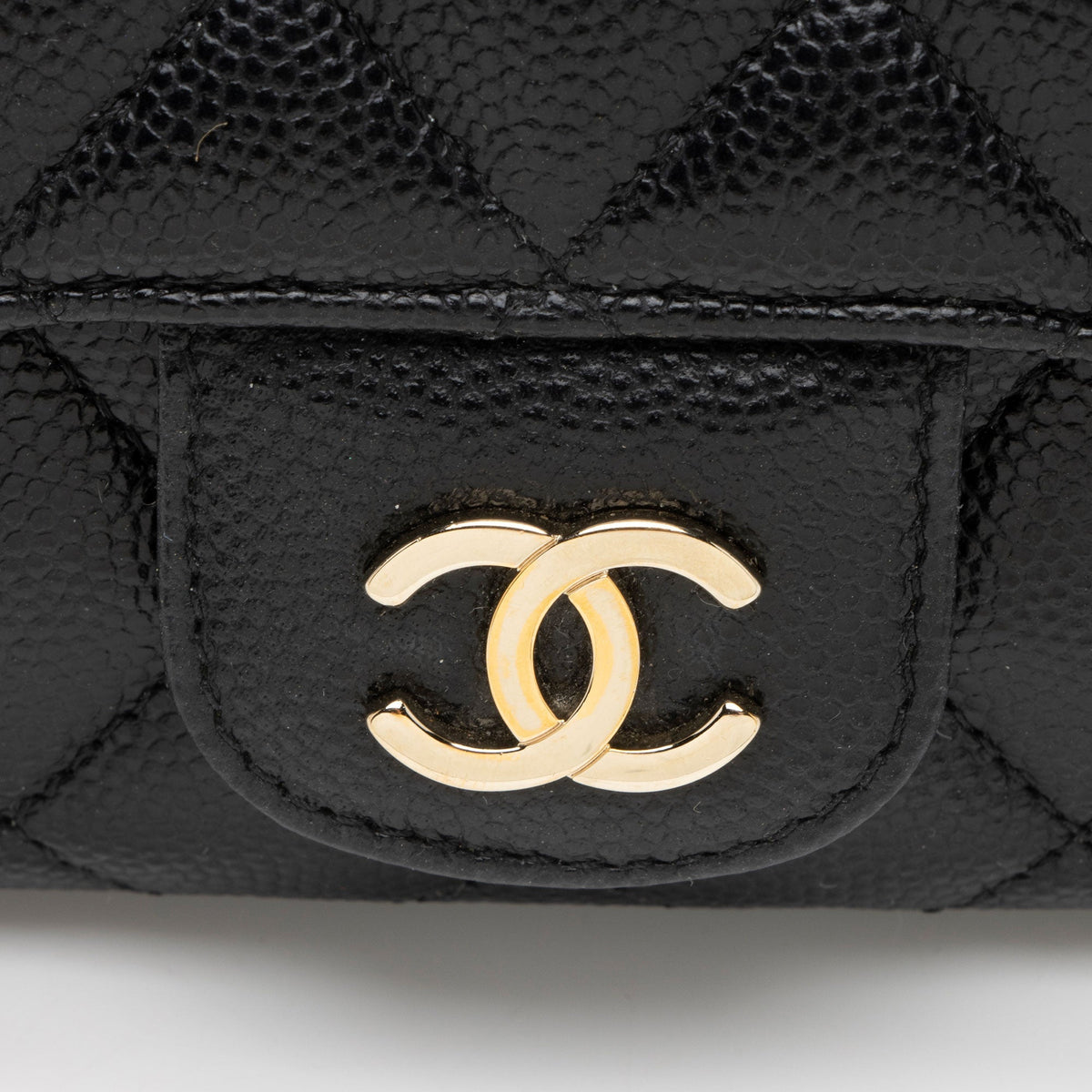 Chanel Quilted Caviar Leather Mini Chain Bag (SHF-gYvxkq)