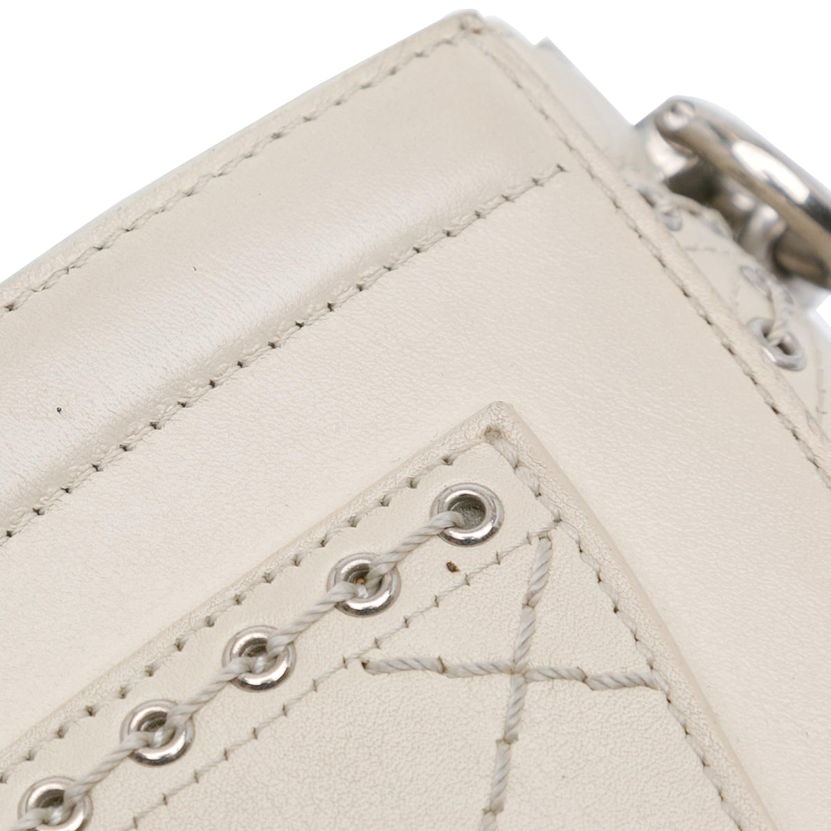 Chanel Small Calfskin Coco Eyelets Round Flap (SHG-J36UdW)