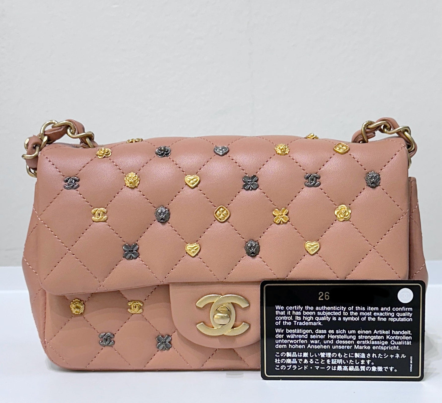 Authentic Chanel 2018 Blush Beige Mini Flap Bag with Lucky Charms Stud Embellishment