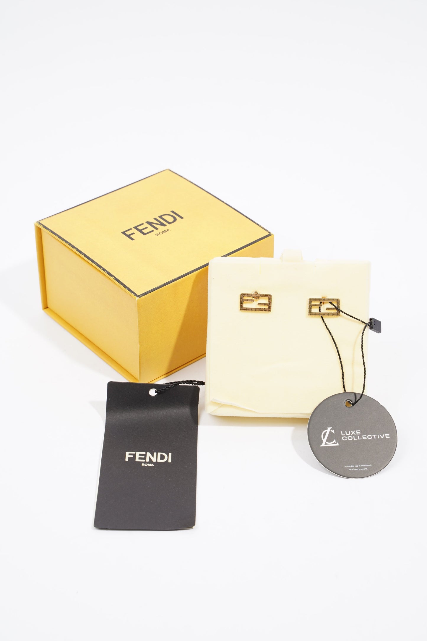 Fendi Baguette Earrings Gold Finish Base Metal