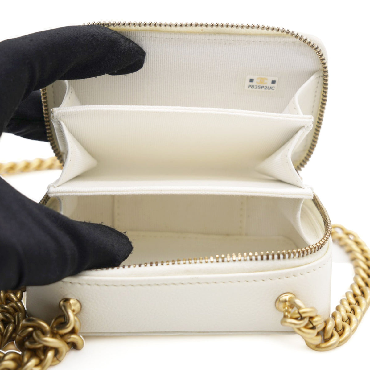 Chanel White caviar mini boy clutch on chain