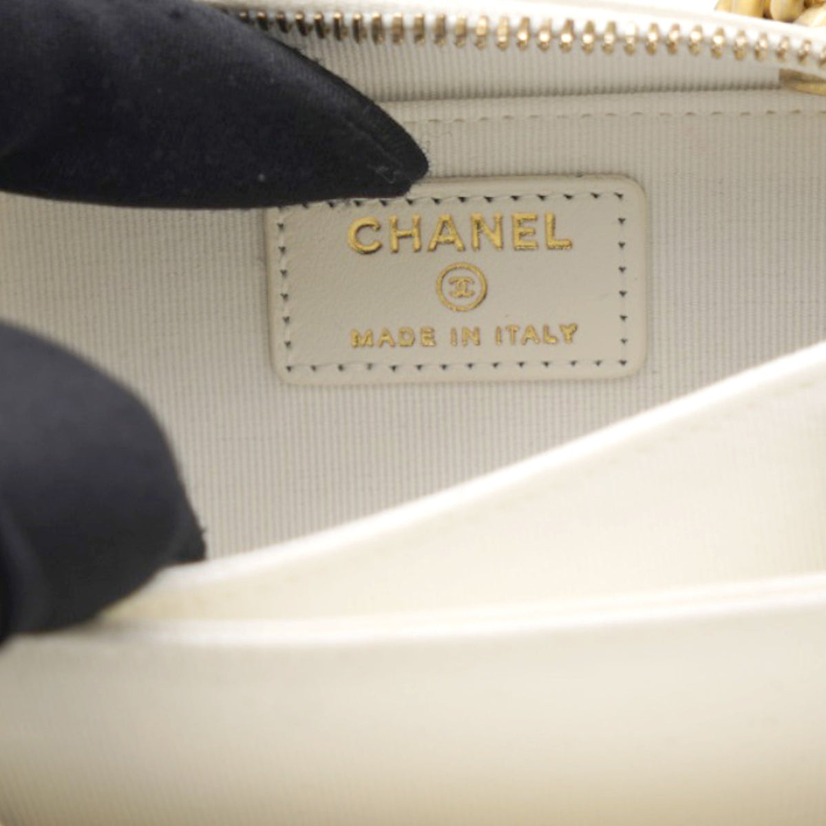 Chanel White caviar mini boy clutch on chain