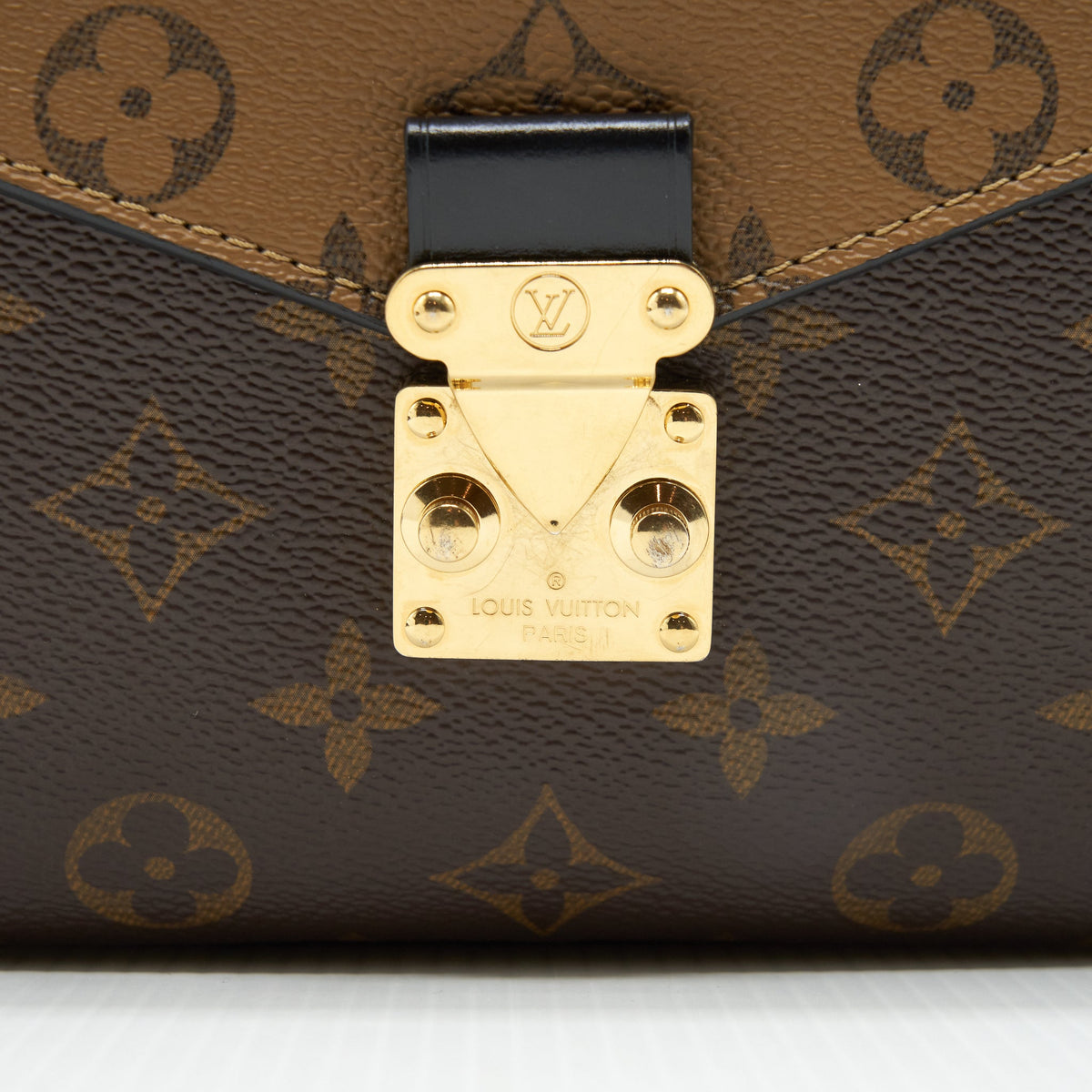 Louis Vuitton Pochette Métis Reverse Monogram Canvas GHW