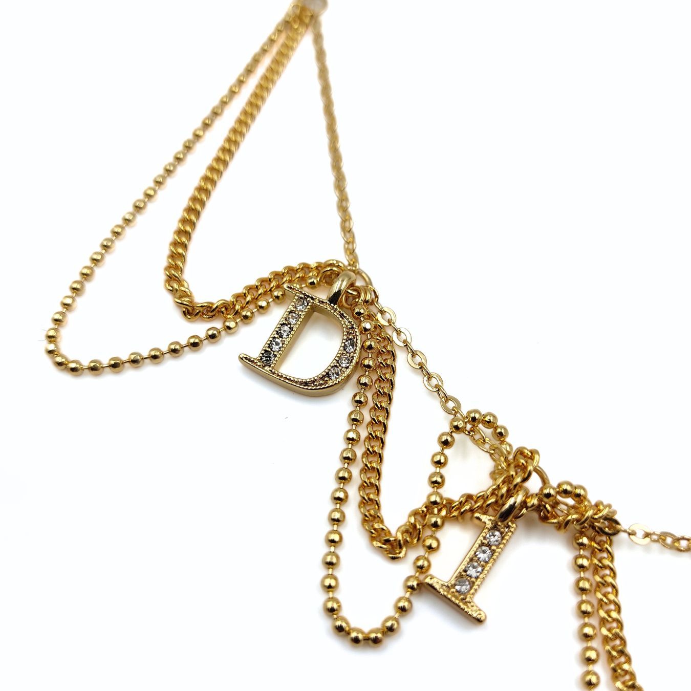 DIOR women's necklace in golden metal and rhinestones