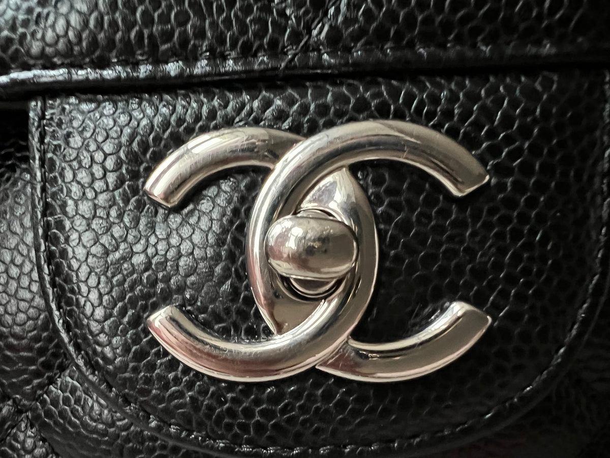 Chanel Maxi Double Flap in Black Caviar