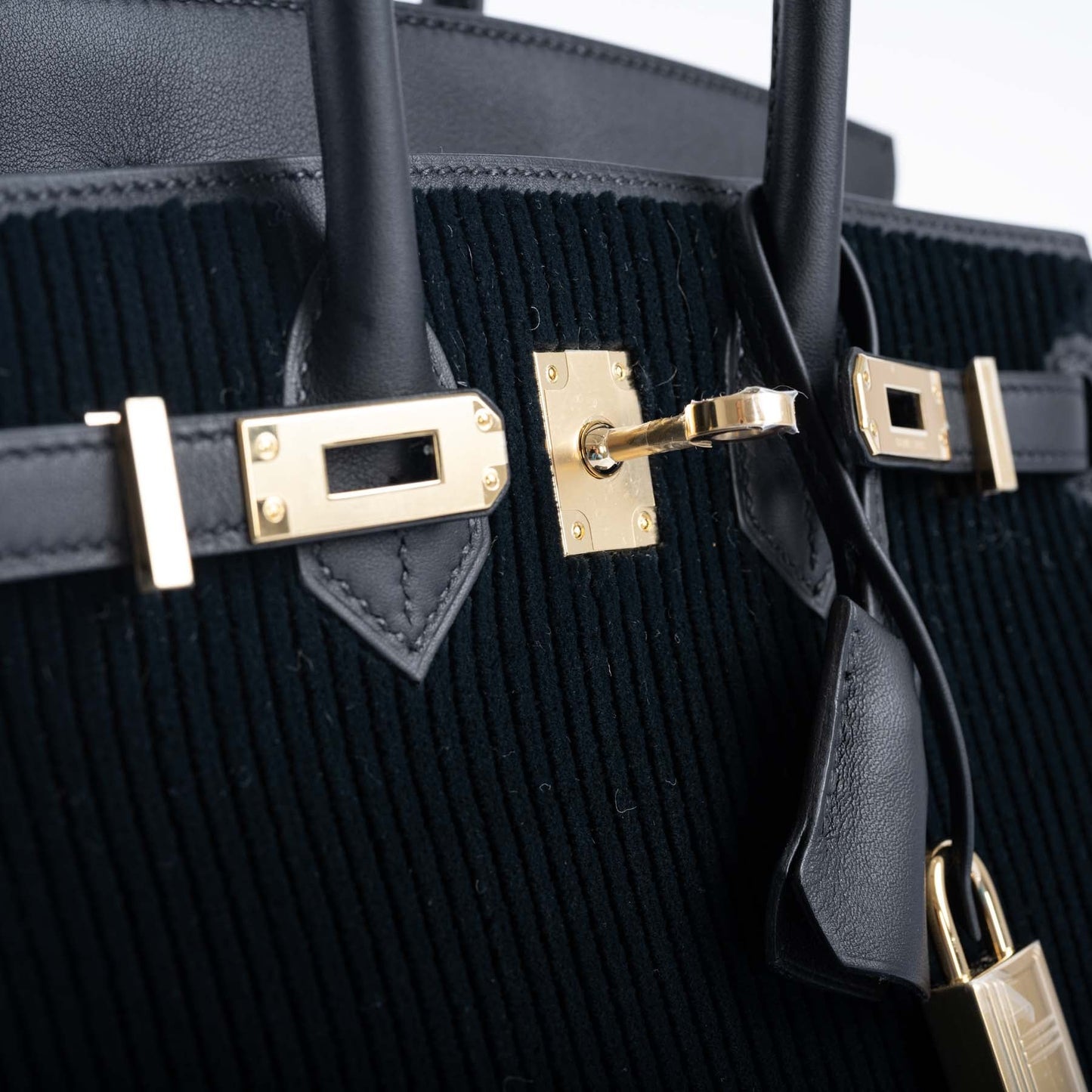 Hermès Birkin 25 Black côte à côte tuffetage and Swift Permabrass Hardware