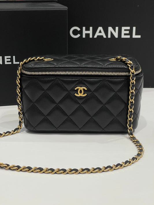Chanel - sac vanity en cuir noir chaîne rétractable