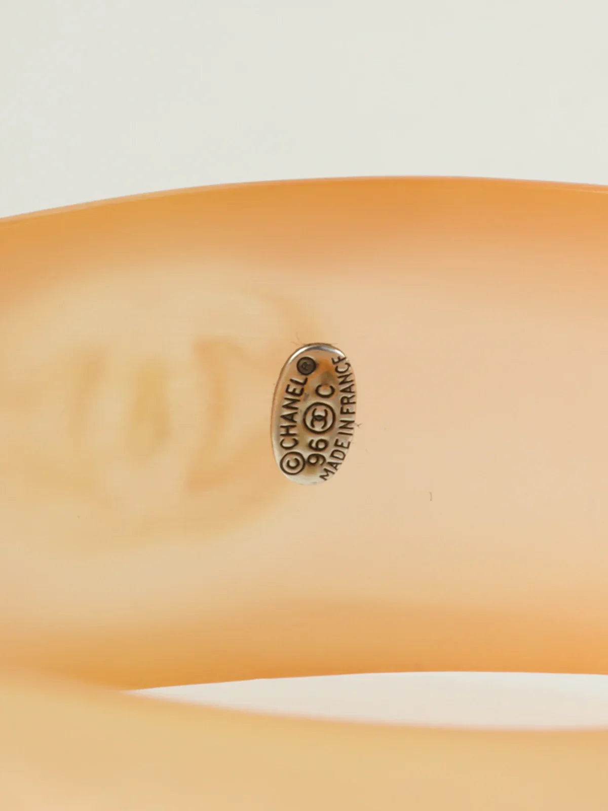 CHANEL 1996 Made Cc Mark Bangle Clear/Orange