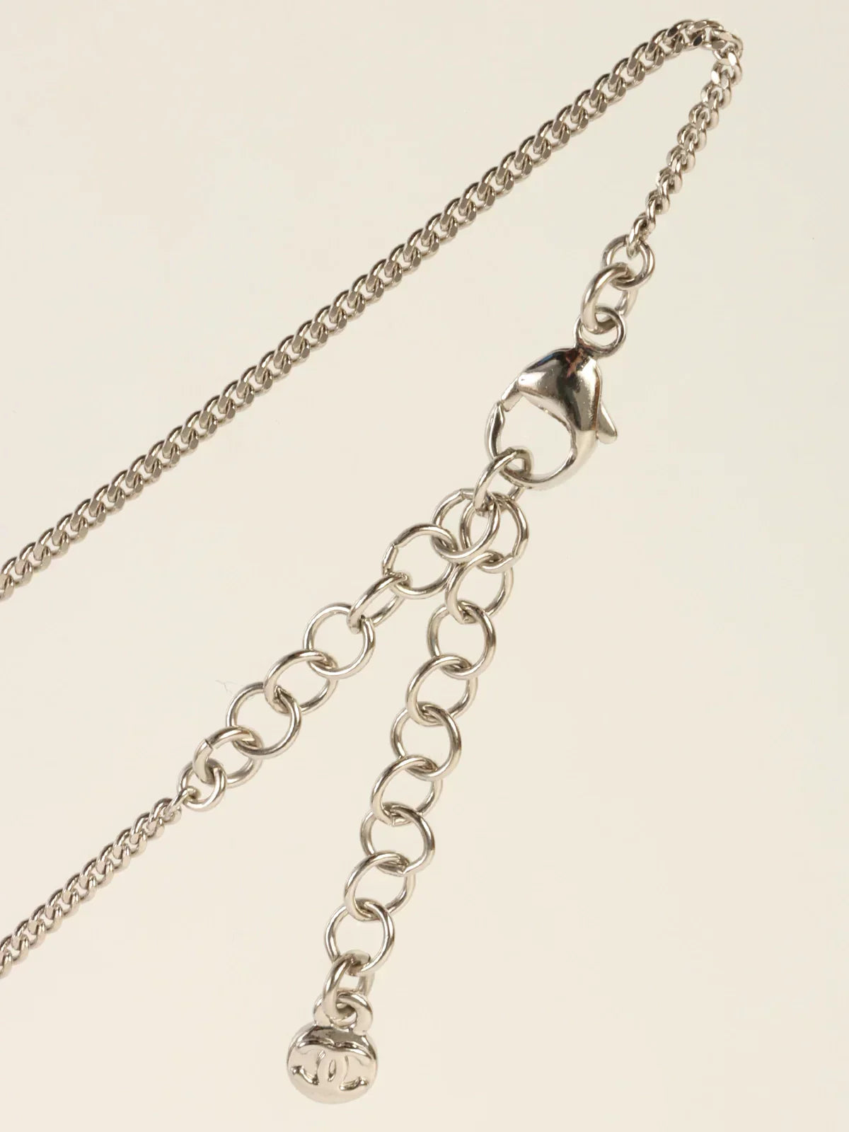 CHANEL 2012 Made Rhinestone Diamond Motif Cc Mark Swing Necklace Silver/Champagne