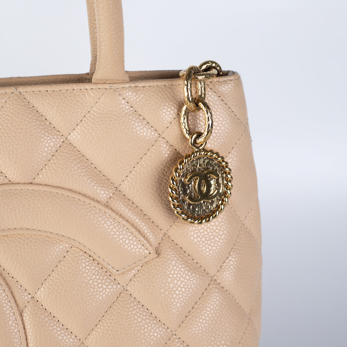 Chanel Quilted Caviar Madelion Tote Beige