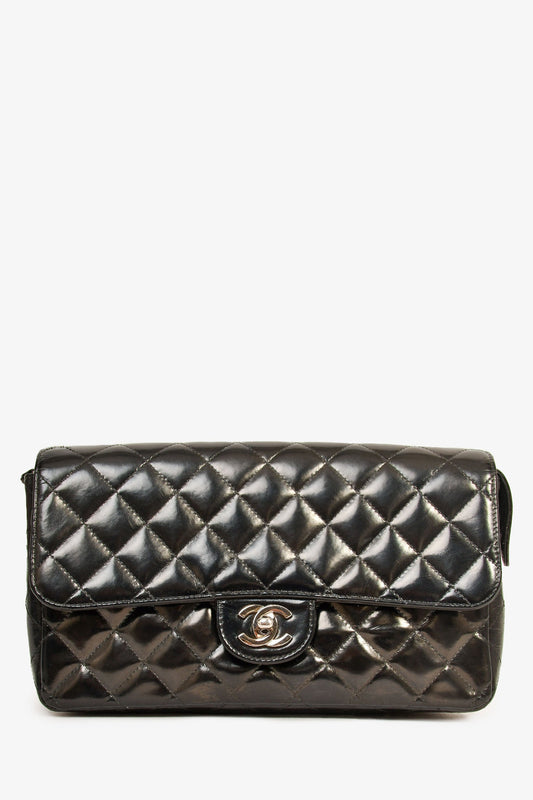 Chanel™ 1996-7 Black Quilted Leather Flap Zip Backpack (Refurbished)