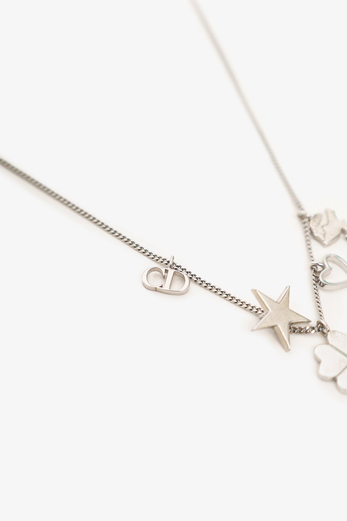 Christian Dior Silver Tone Four Leaf Clover/Star/Heart Charm Necklace