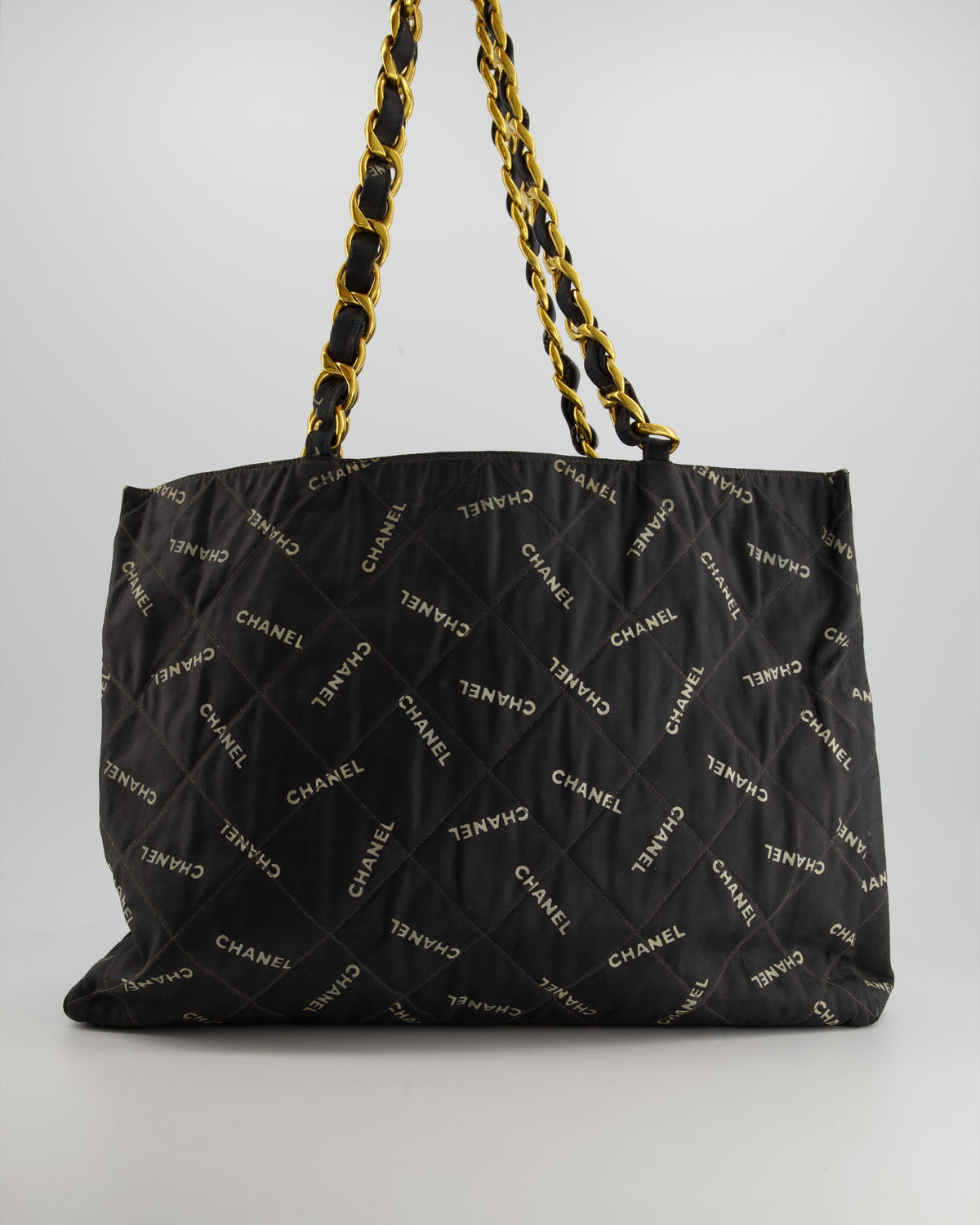 Chanel Vintage Black Bag in Quilted Canvas Logo Print with Gold Hardware