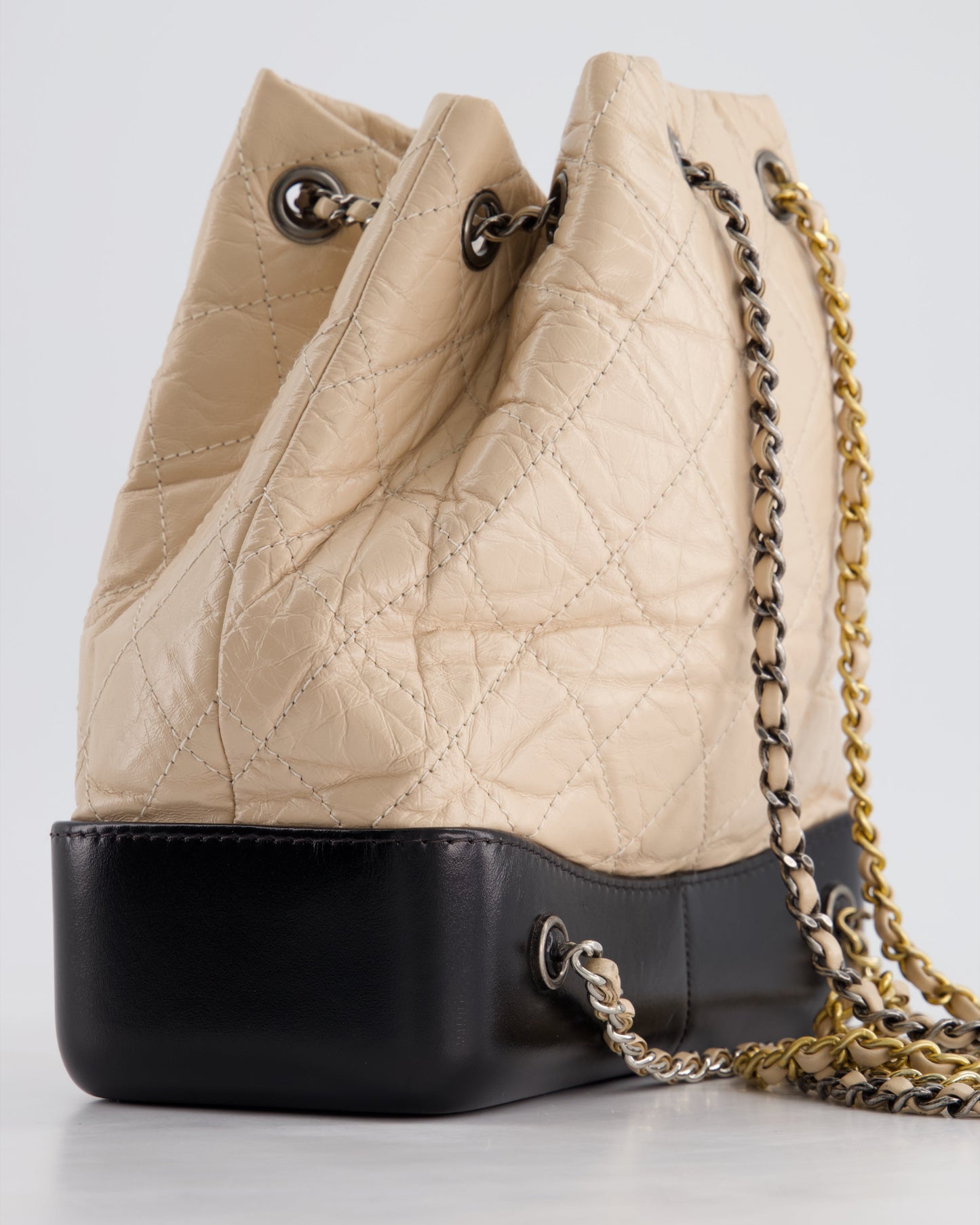 Chanel Nude, Black Mini Gabrielle Backpack in Aged Calfskin Leather with Ruthenium & Brushed Gold Hardware