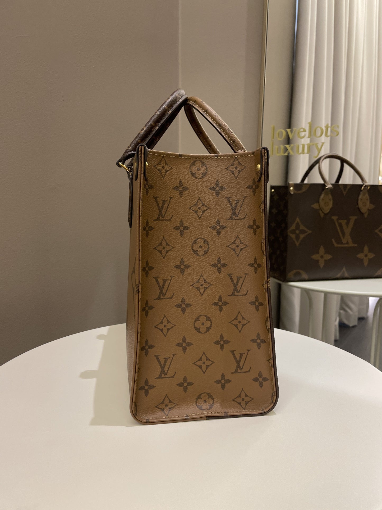 Louis Vuitton Onthego Tote MM Reversed Monogram