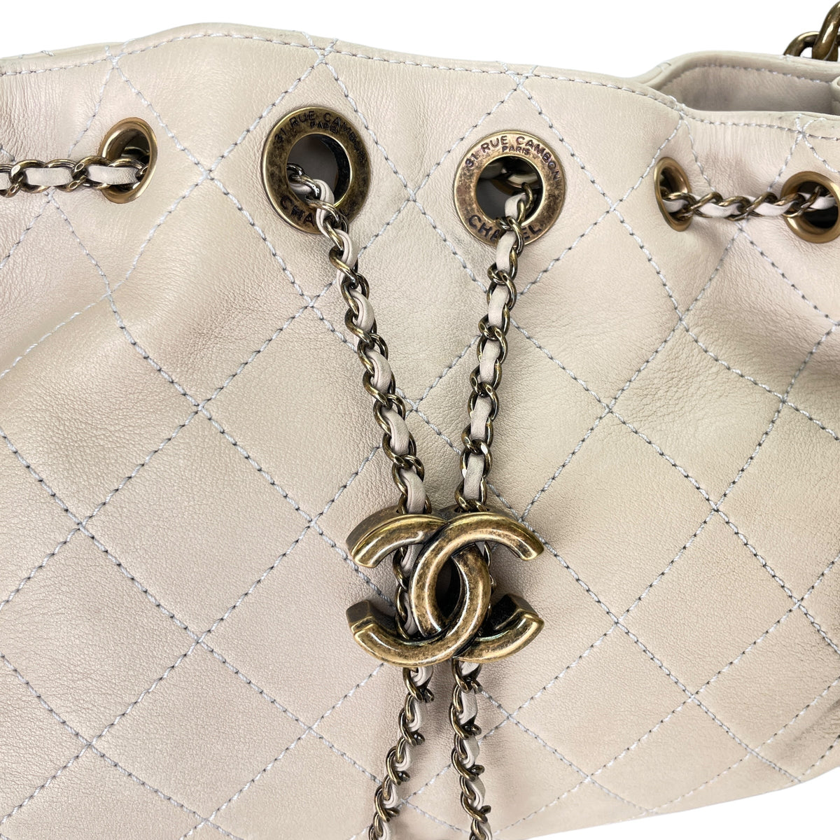 Drawstring CC White Bucket Bag in Lambskin, Gold hardware