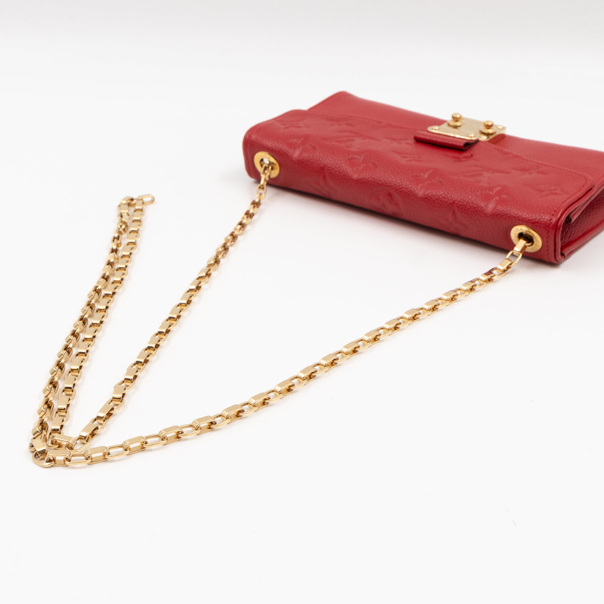 Saint Germain Pochette with chain Monogram Empreinte Red