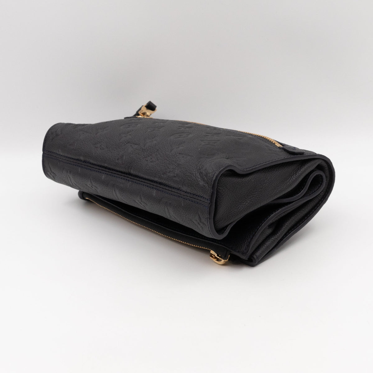 Petillante Clutch Bleu Infini Monogram Empreinte