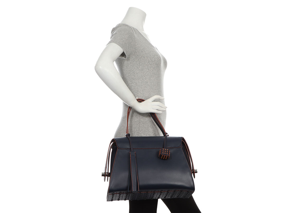 Tod’s Navy Duffle Bag
