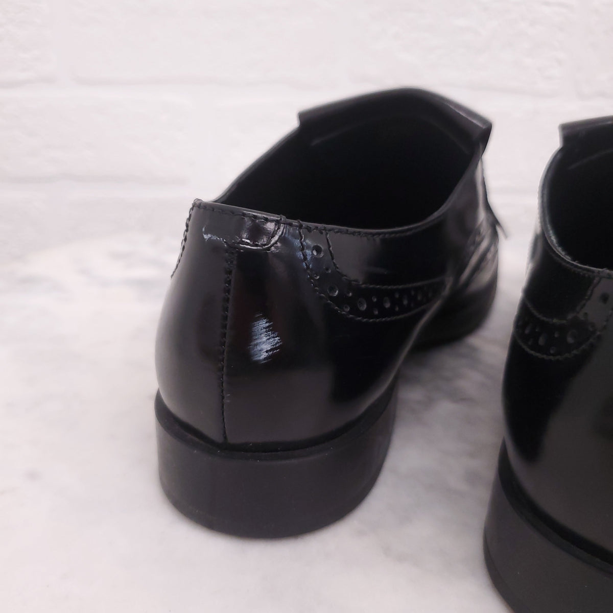 TODS BLACK SPECTATORS WITH BUCKLE - SIZE 7.5