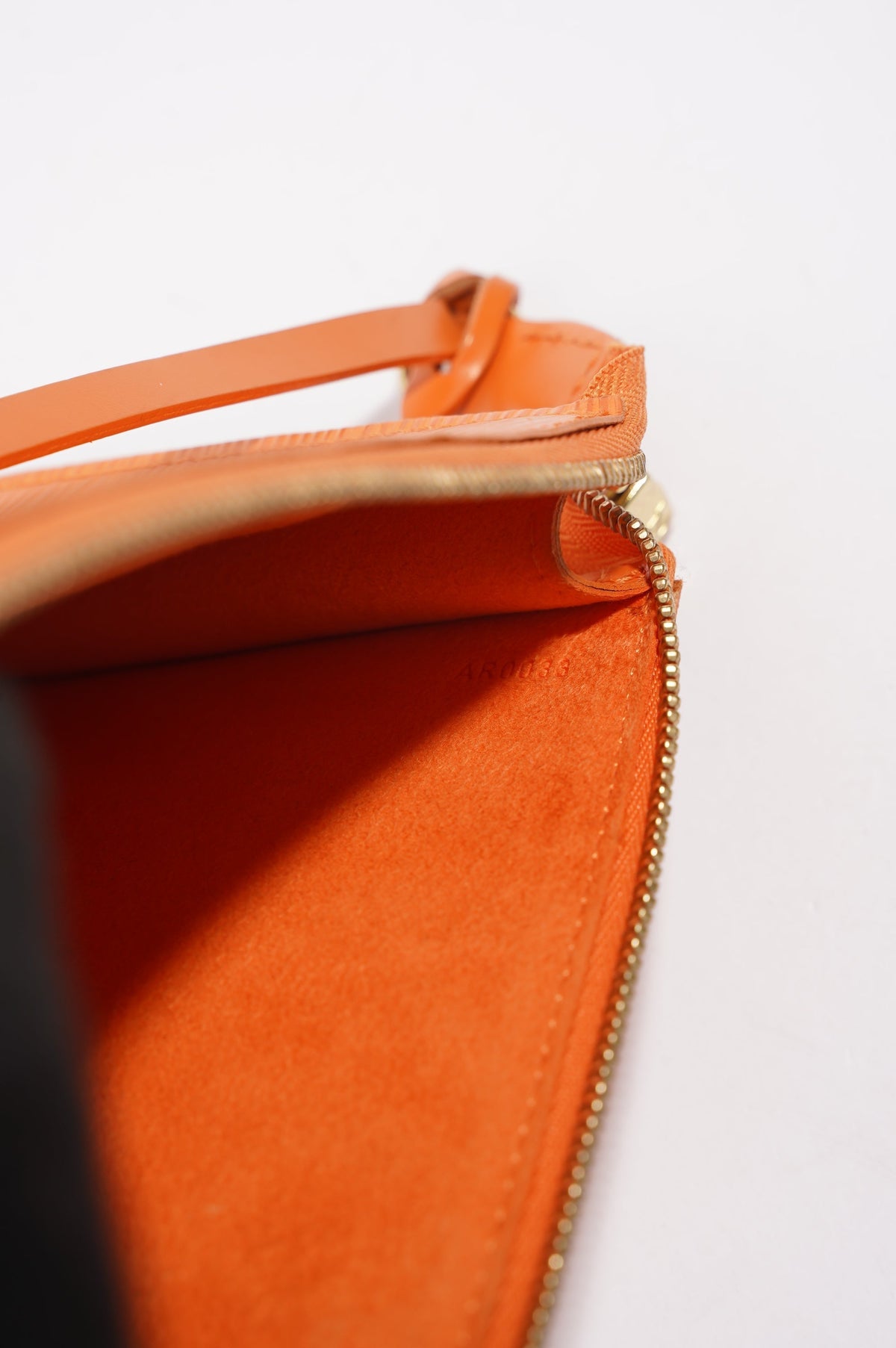 Louis Vuitton Pochette Orange Epi Leather
