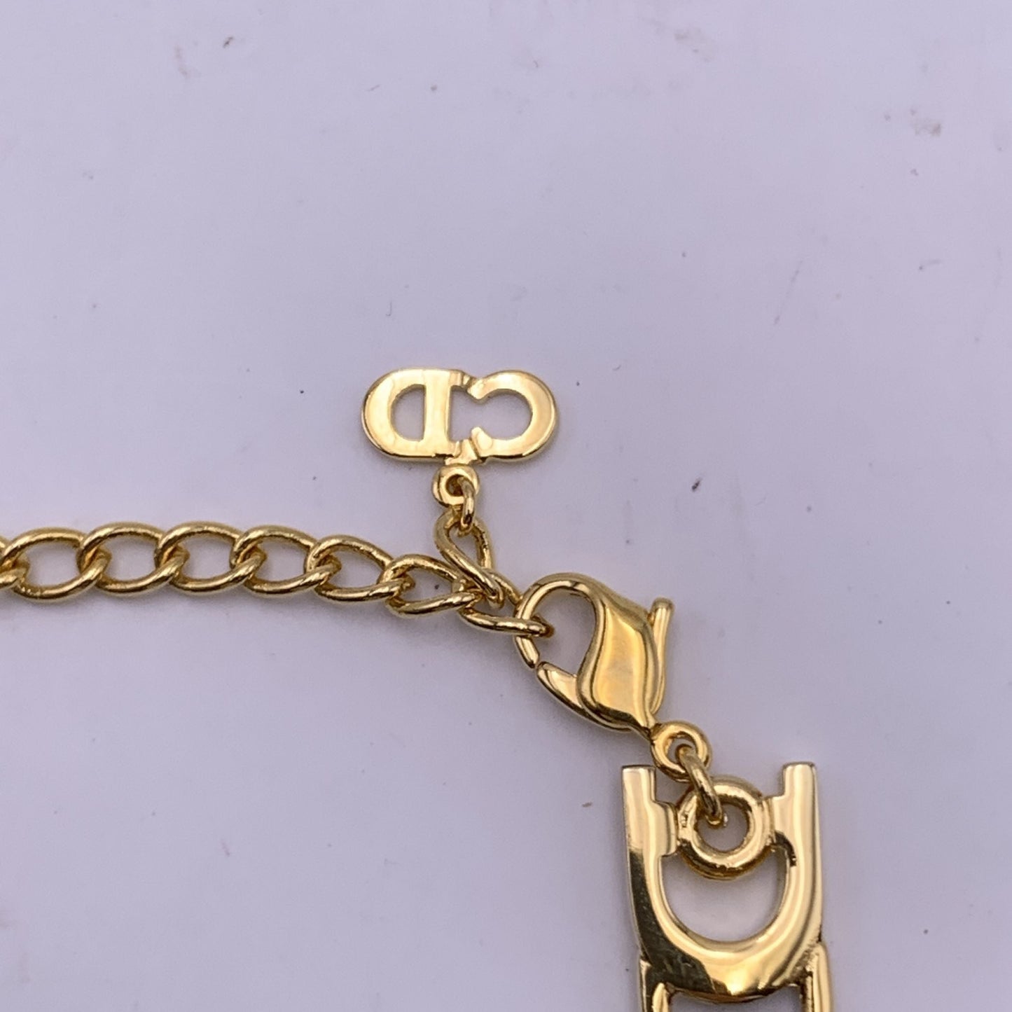CHRISTIAN DIOR Vintage Gold Metal Black Ribbon Logo Plate Bracelet