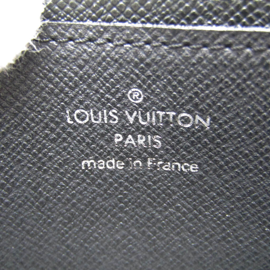Louis Vuitton Taiga Zippy-Coin- Men's