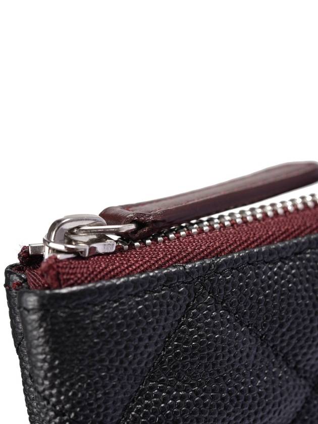 Women s un clutch caviar large Chanel