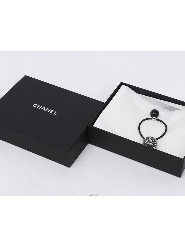 crystal ball hair scrunchie Chanel