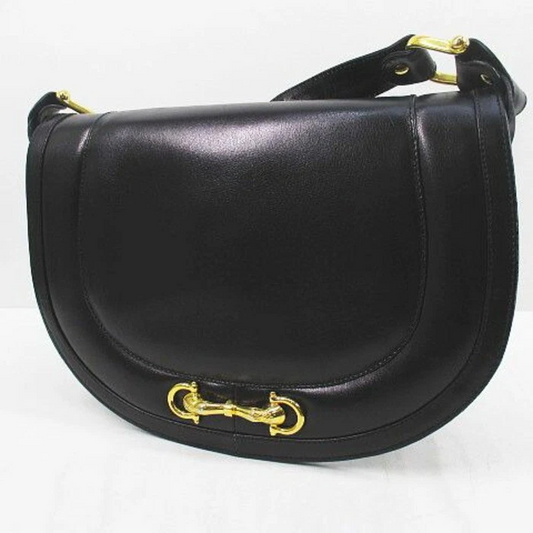 'Cosci' by Gucci black leather two way saddle bag with gold equestrian accents