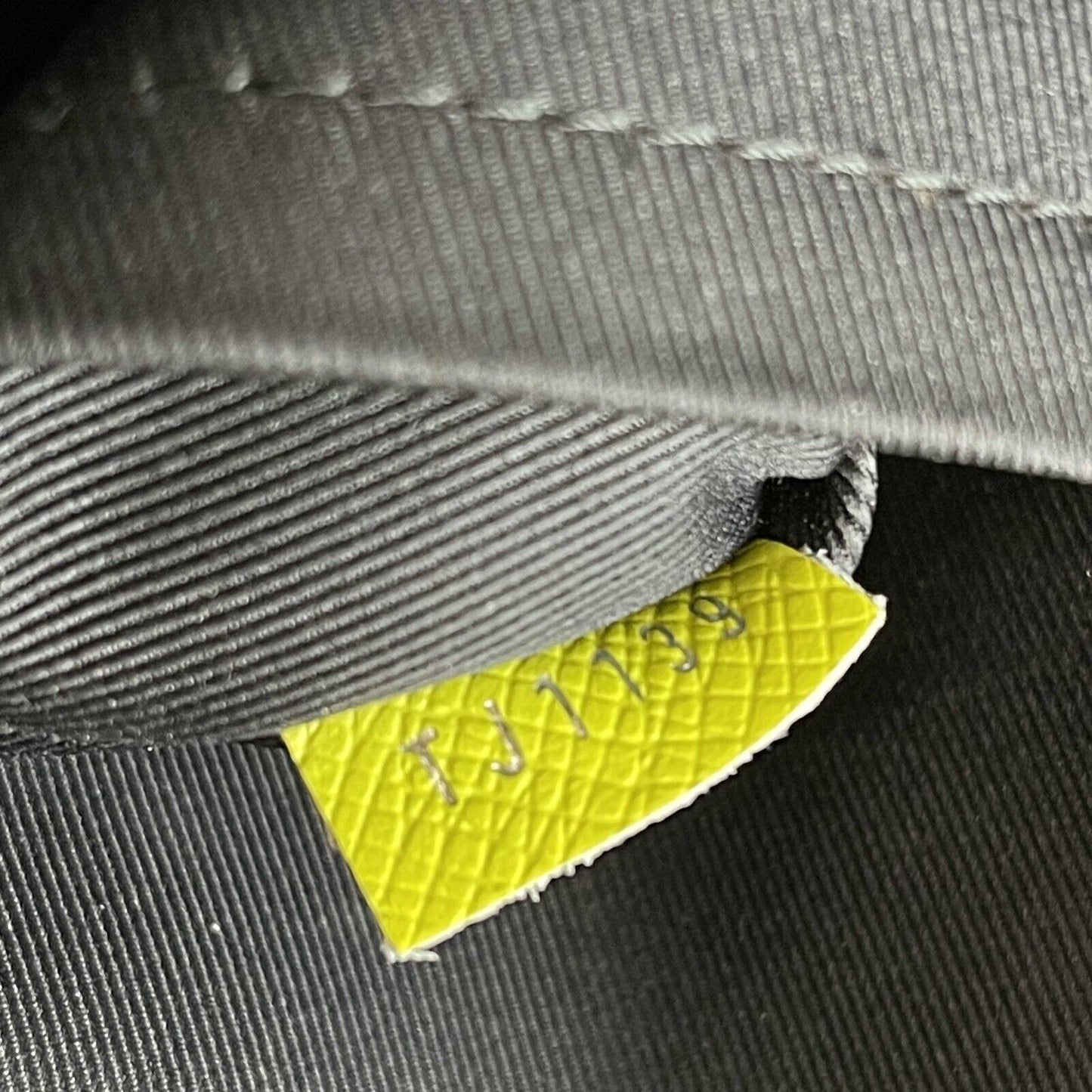 LOUIS VUITTON Taiga Monogram Discovery Backpack Neon Yellow