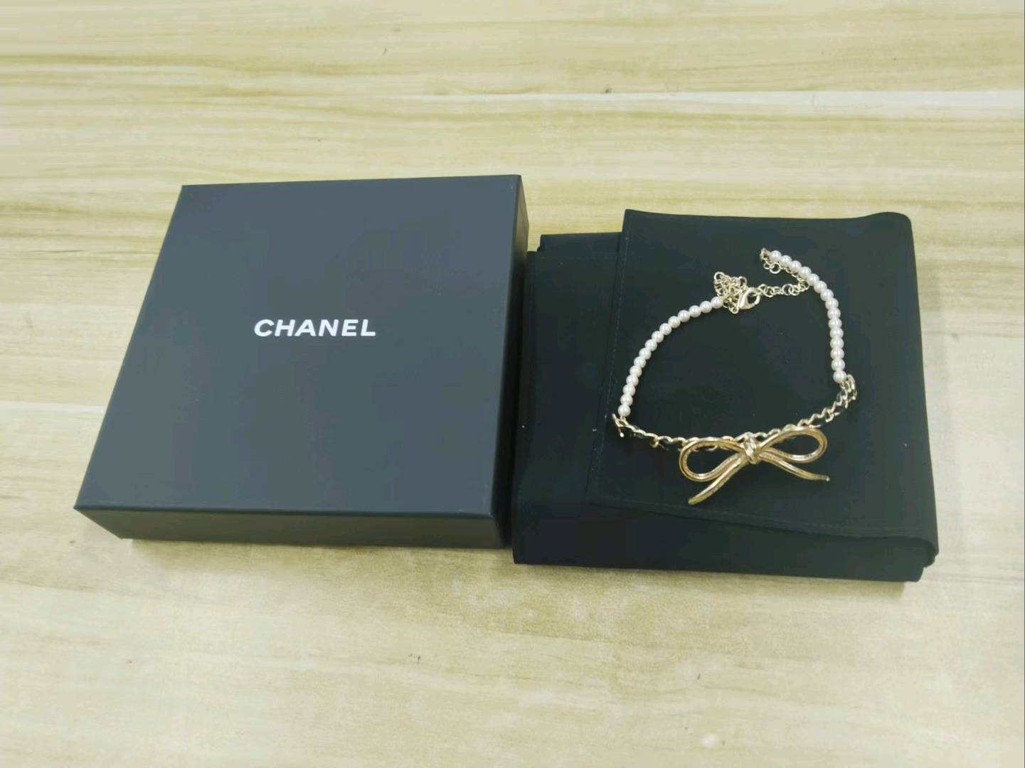 Chanel Bow Pearl Necklace