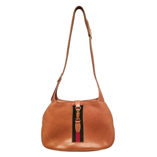 Rare, vintage, Gucci, camel leather 1961 Jackie hobo shoulder bag with a red & green center stripe, gold piston closure, & extender strap
