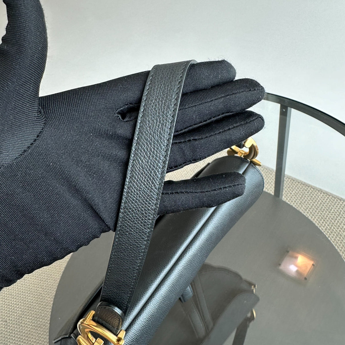 Saddle Medium Grained Calfskin Black GHW