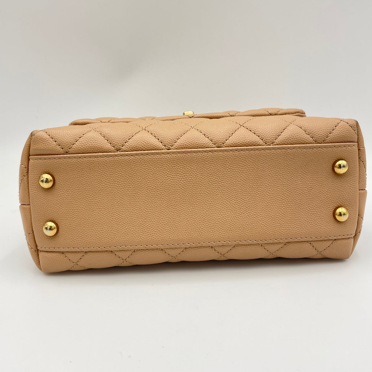 Coco Small Beige Top Handle Bag in Caviar Leather, Gold hardware