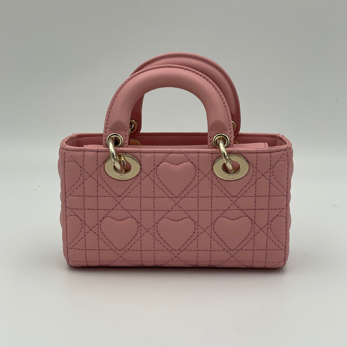 D-Joy Micro Pink Top Handle Bag in Lambskin, Light Gold hardware